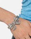 Its All A-BOW-t Me - White Bracelet - Paparazzi Accessories